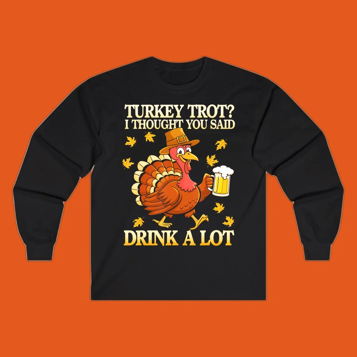 Funny turkey trot drinking pun design with a turkey holding a beer and text 'Turkey Trot? I thought you said Drink a Lot'.