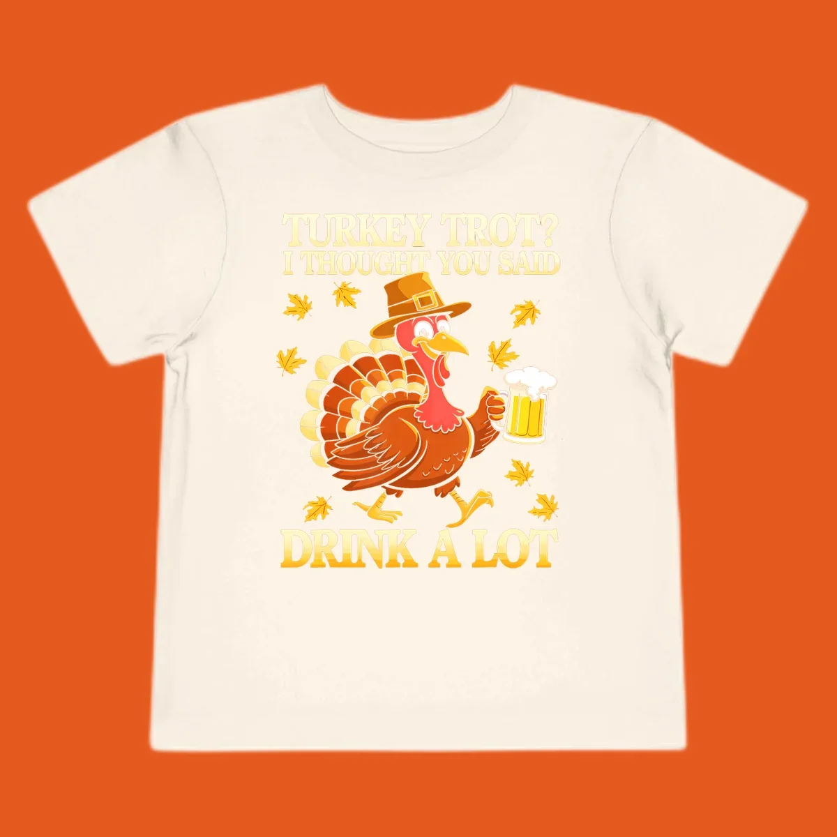 Funny turkey trot drinking pun design with a turkey holding a beer and text 'Turkey Trot? I thought you said Drink a Lot'.