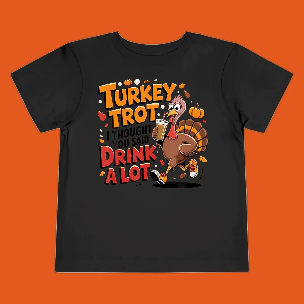 Cartoon turkey running with a drink, text says Turkey Trot I Thought You Said Drink A Lot. Funny Thanksgiving race design.