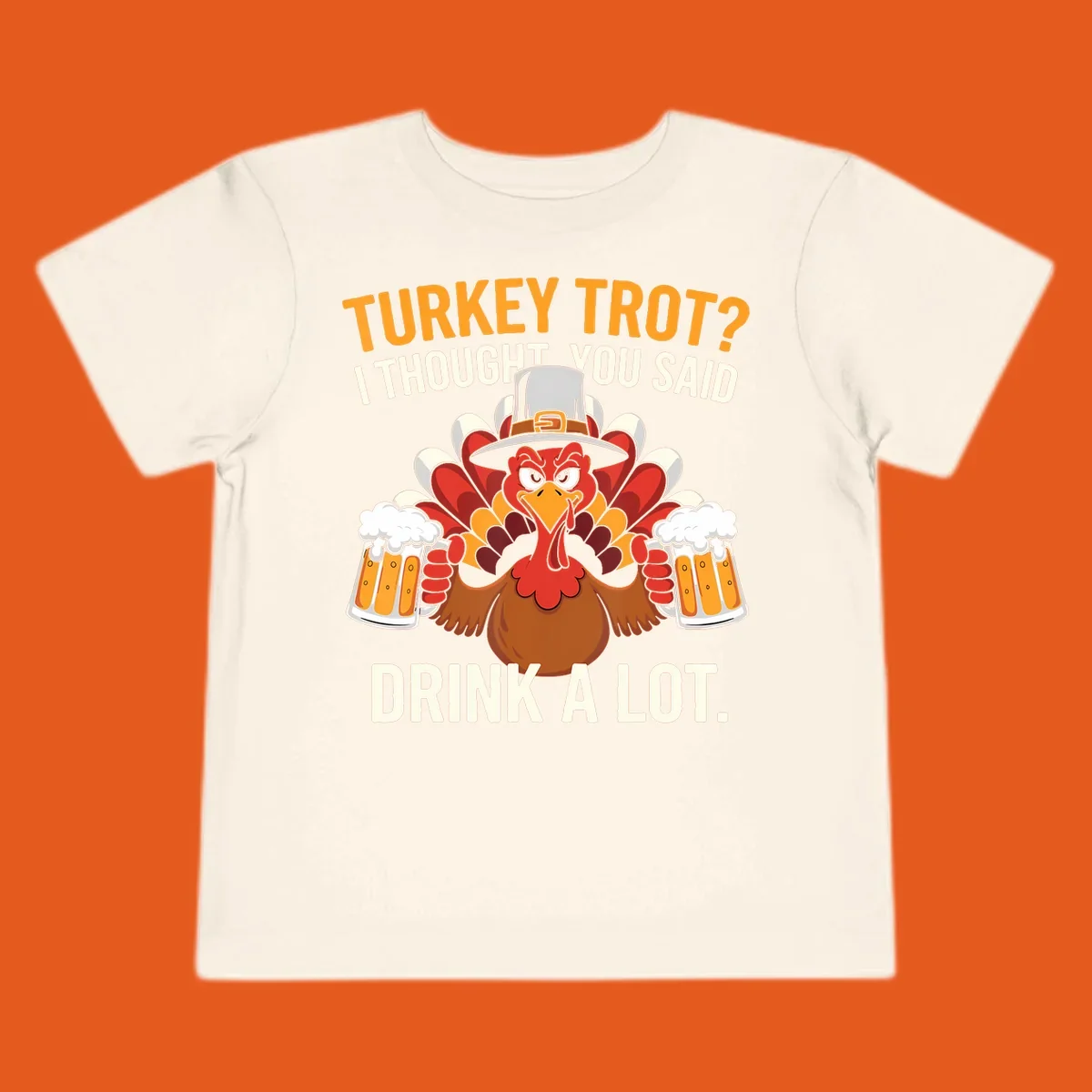 Funny pilgrim turkey character holding beer mugs with text "Turkey Trot I Thought You Said Drink A Lot".