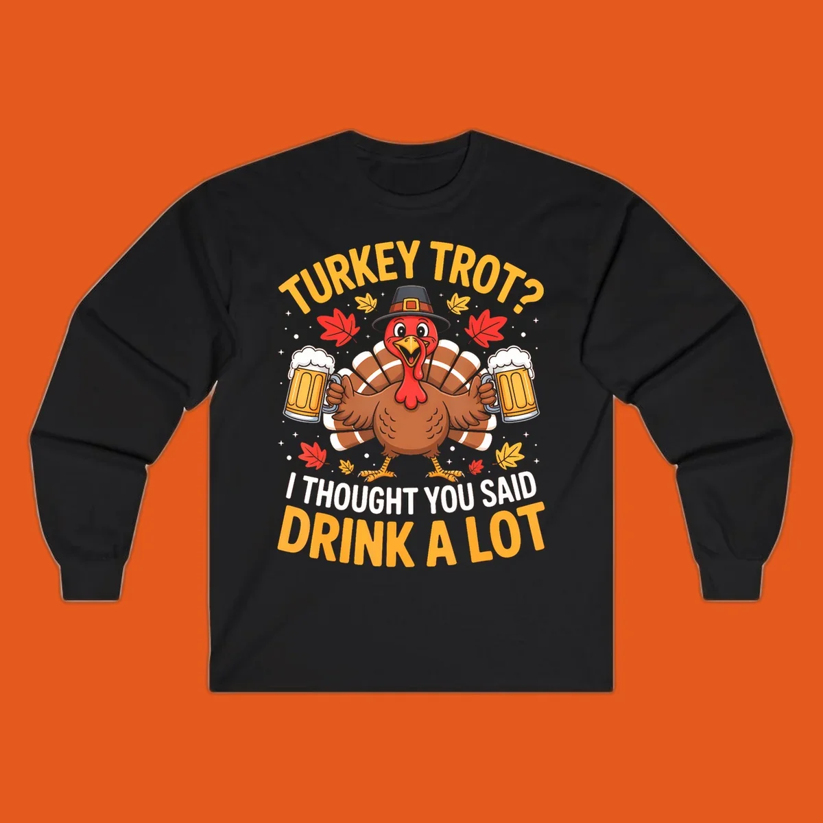 Turkey trot design with a turkey holding beer mugs, text says "Turkey Trot? I Thought You Said Drink A Lot."