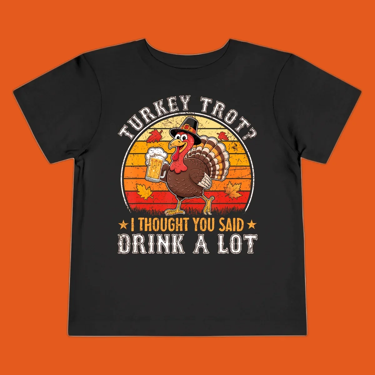 Turkey Trot Drink A Lot Design: Cartoon turkey in pilgrim hat holding beer, with text about drinking.
