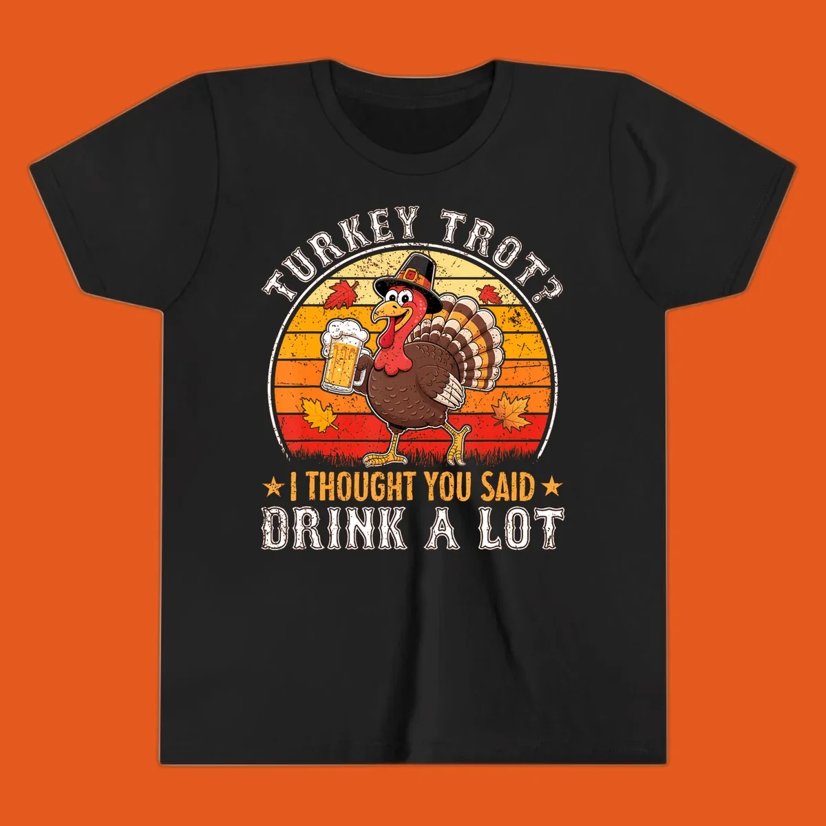 Turkey Trot Drink A Lot Design: Cartoon turkey in pilgrim hat holding beer, with text about drinking.