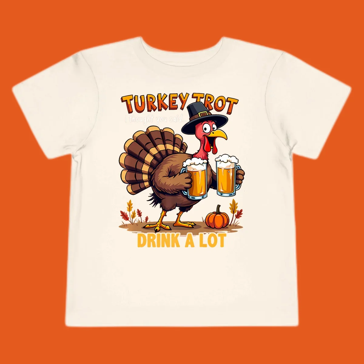 Cartoon turkey holding beer mugs with text 'Turkey Trot' and 'Drink A Lot'.