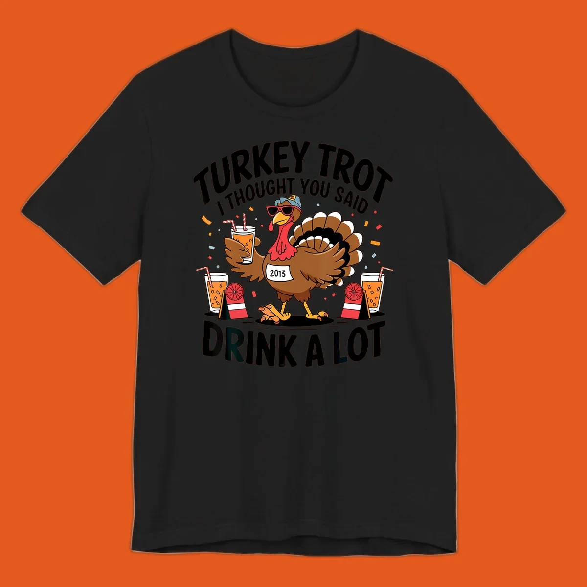 Turkey Trot I Thought You Said Drink A Lot design featuring a cartoon turkey holding a drink.