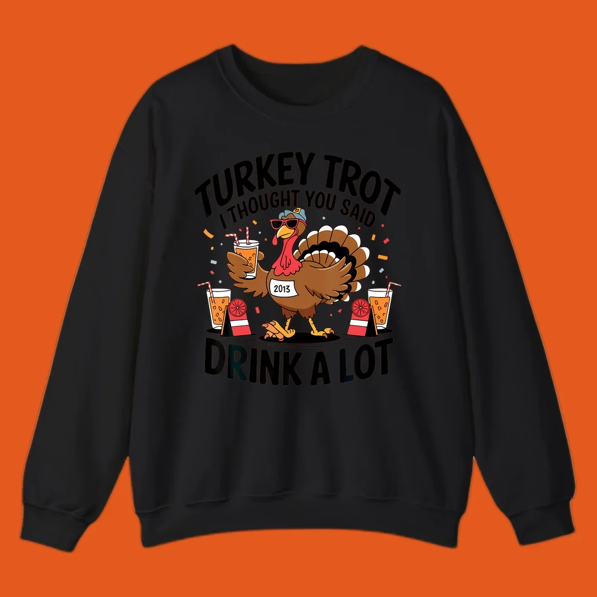 Turkey Trot I Thought You Said Drink A Lot design featuring a cartoon turkey holding a drink.