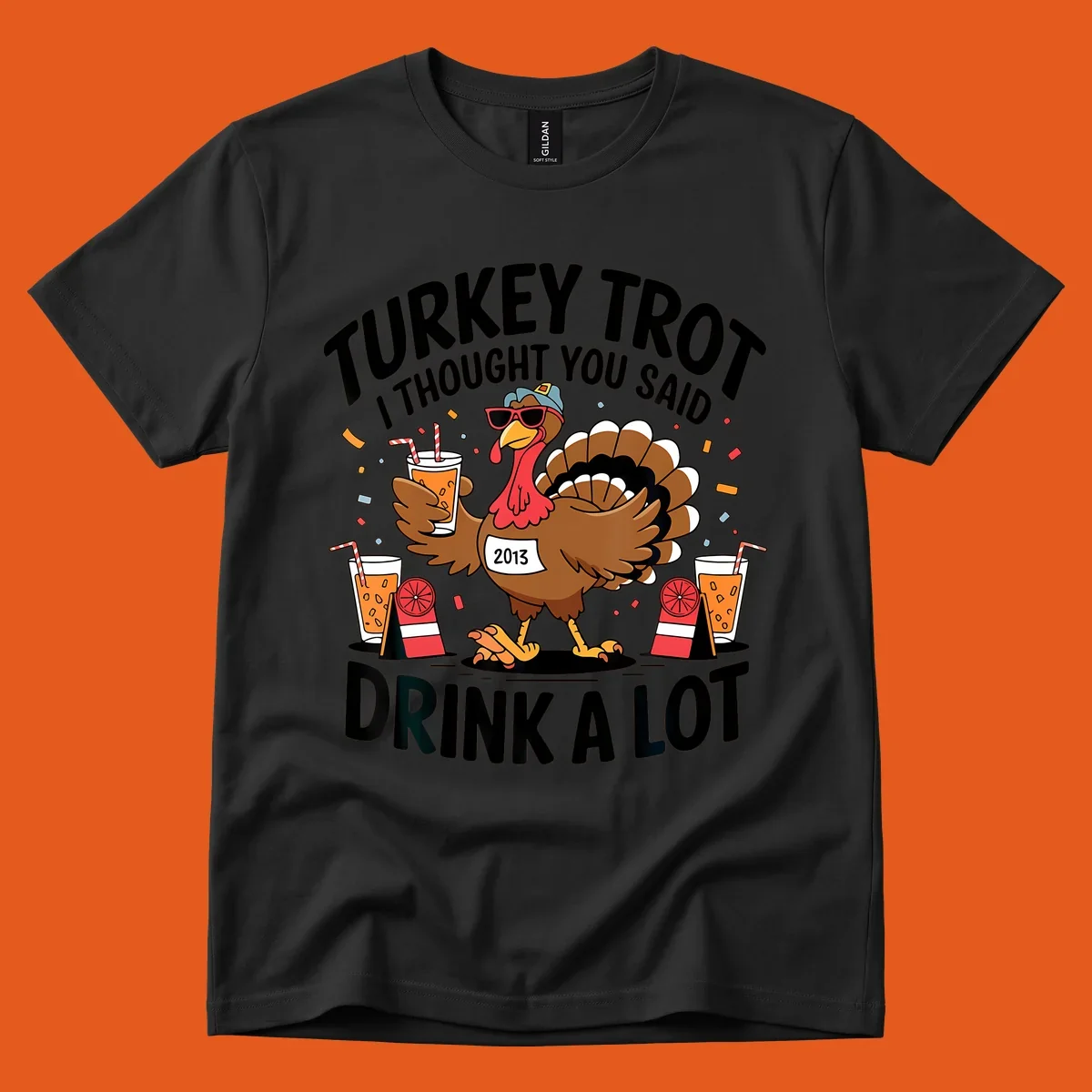 Turkey Trot I Thought You Said Drink A Lot design featuring a cartoon turkey holding a drink.