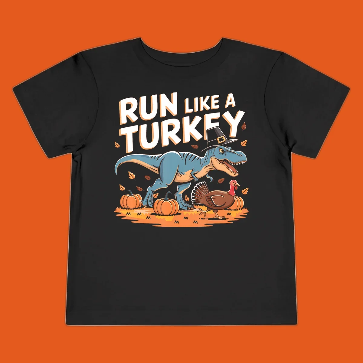 Run like a turkey dinosaur design with T-Rex, turkey, pumpkins and text.