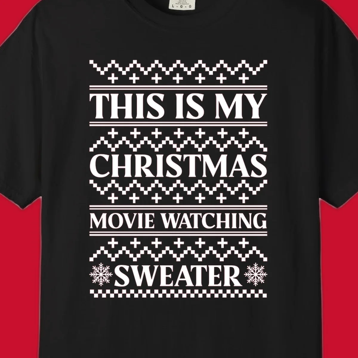 Christmas movie watching sweater with bold text and festive patterns.