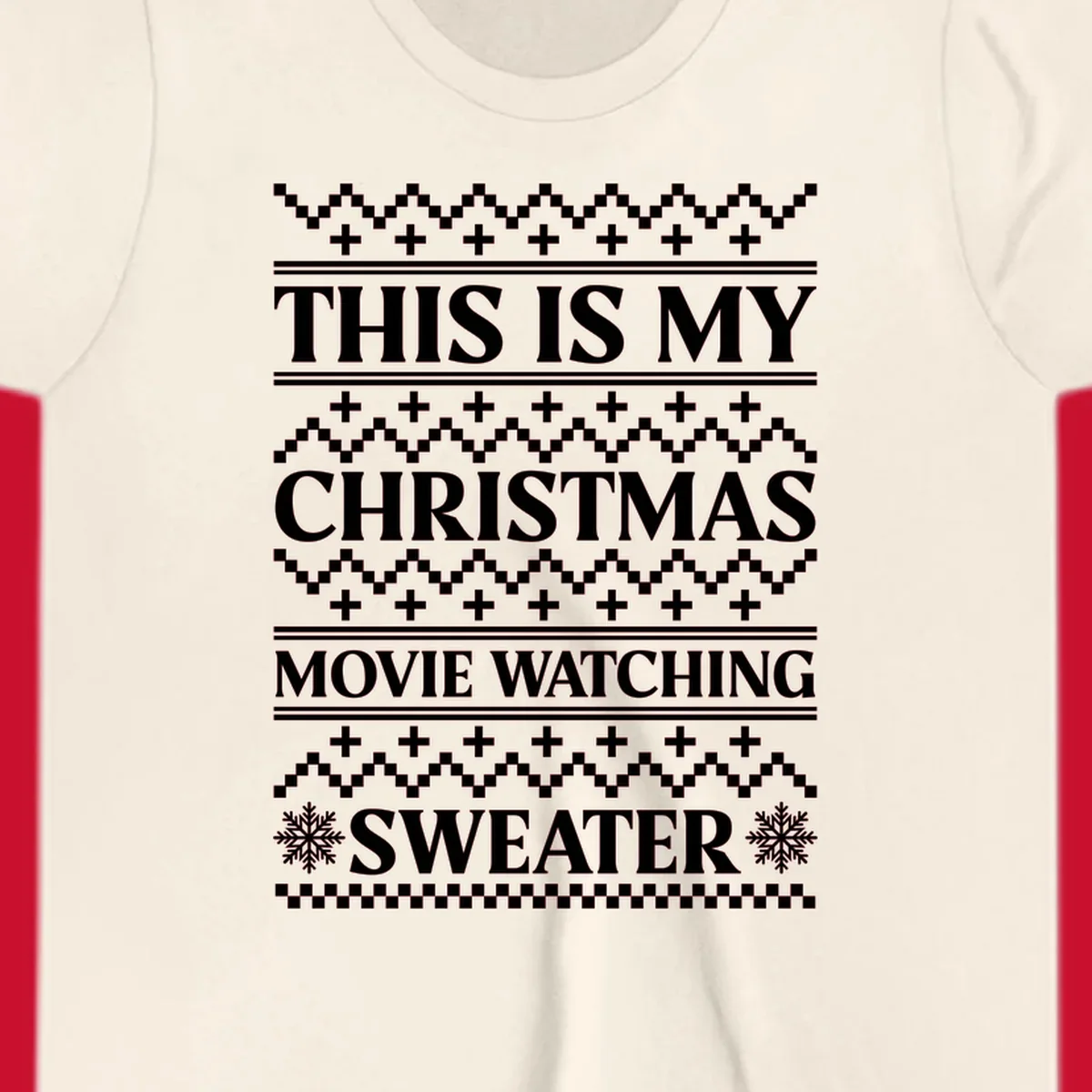 Christmas movie watching sweater with bold text and festive patterns.