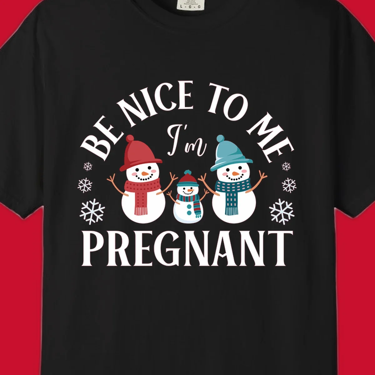 Pregnant snowman family with 'BE NICE TO ME I'm PREGNANT' text and snowflakes.