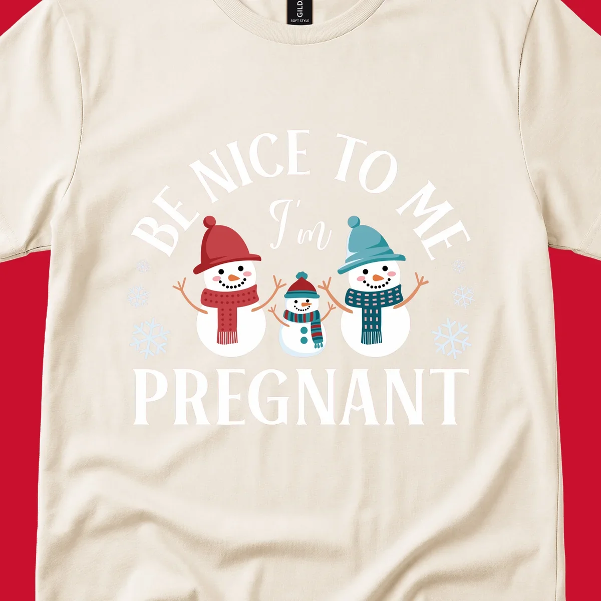 Pregnant snowman family with 'BE NICE TO ME I'm PREGNANT' text and snowflakes.