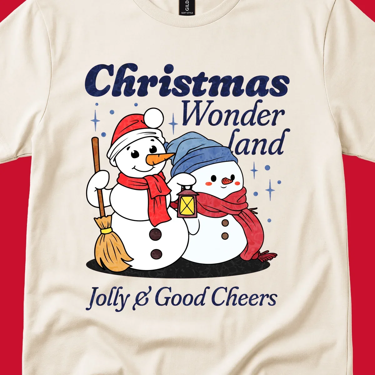 Christmas Wonderland snowmen with lantern and broom, Jolly & Good Cheers text.