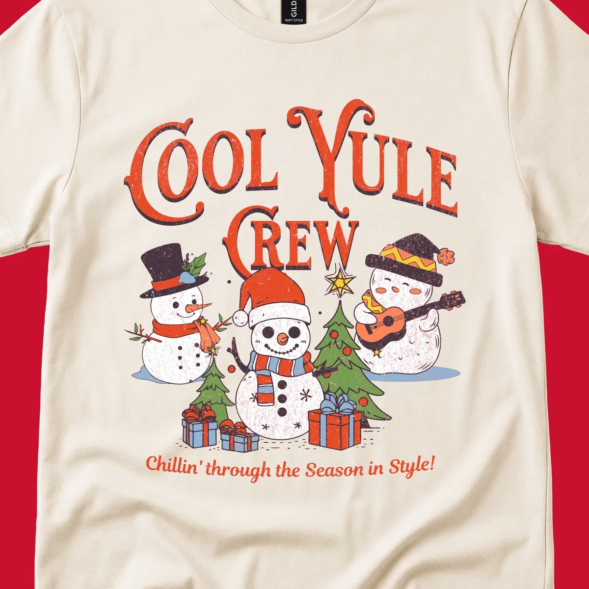 Cool Yule Crew snowmen with guitars and gifts, celebrating the holiday season.