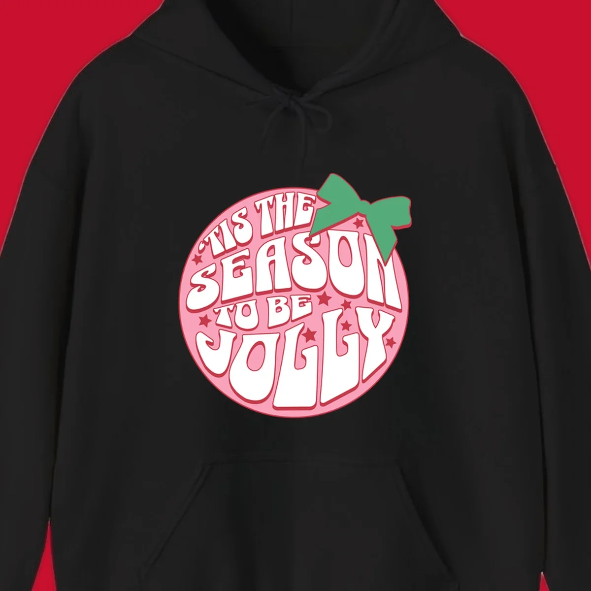 Tis the season to be jolly text with bow and stars, pink oval