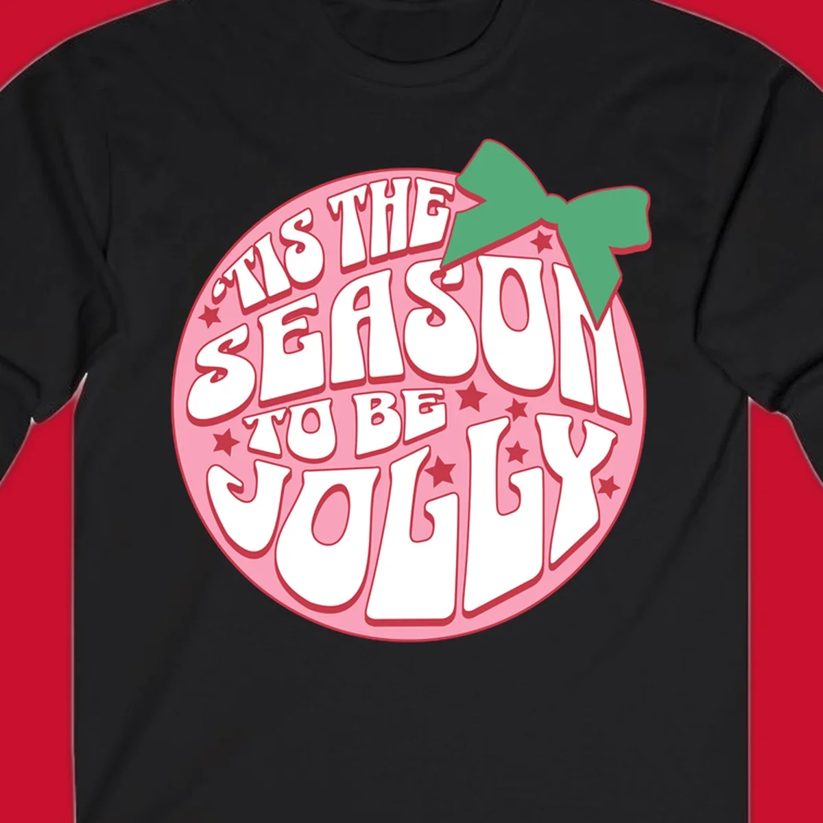 Tis the season to be jolly text with bow and stars, pink oval