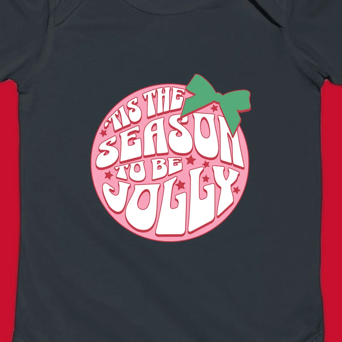 Tis the season to be jolly text with bow and stars, pink oval