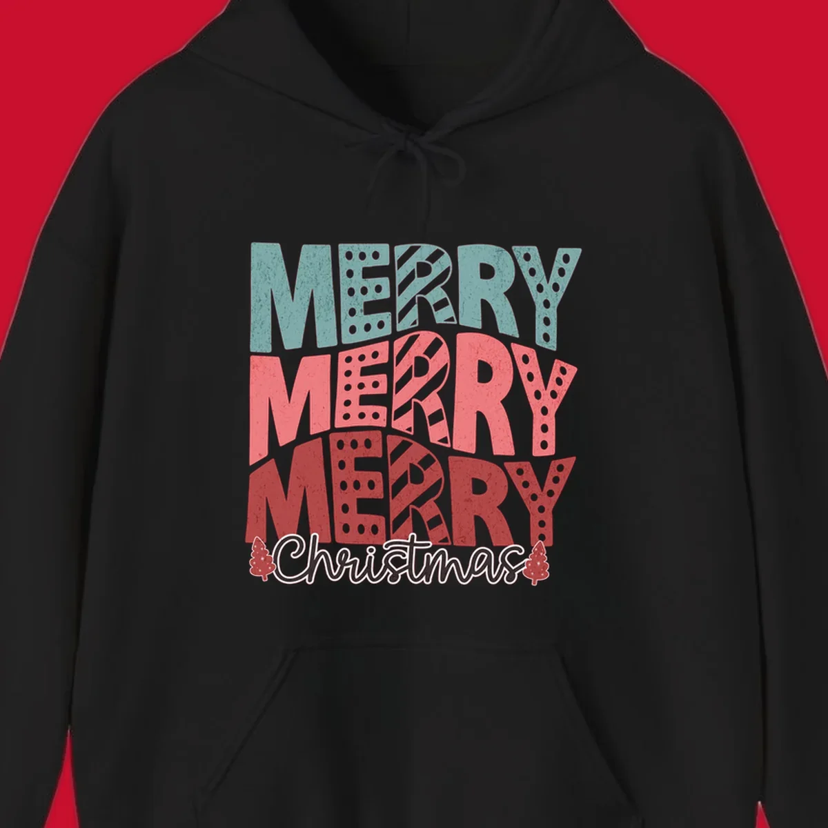 Merry Merry Merry Christmas text design with stacked letters and Christmas trees.