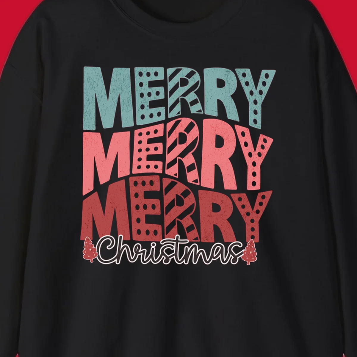 Merry Merry Merry Christmas text design with stacked letters and Christmas trees.