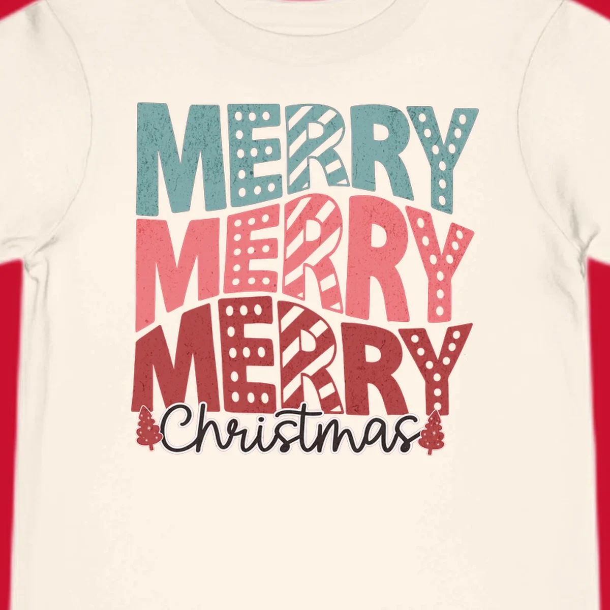 Merry Merry Merry Christmas text design with stacked letters and Christmas trees.