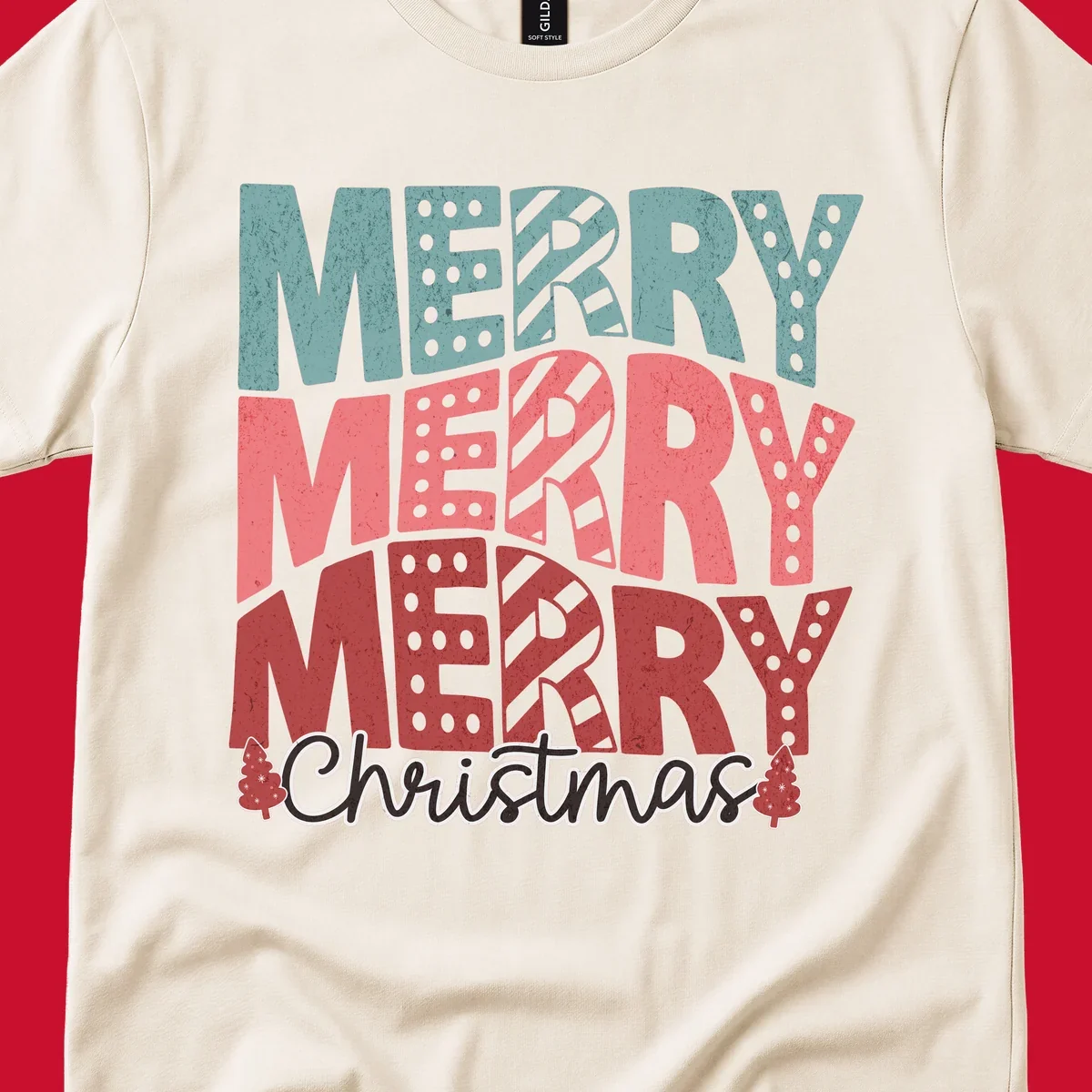 Merry Merry Merry Christmas text design with stacked letters and Christmas trees.