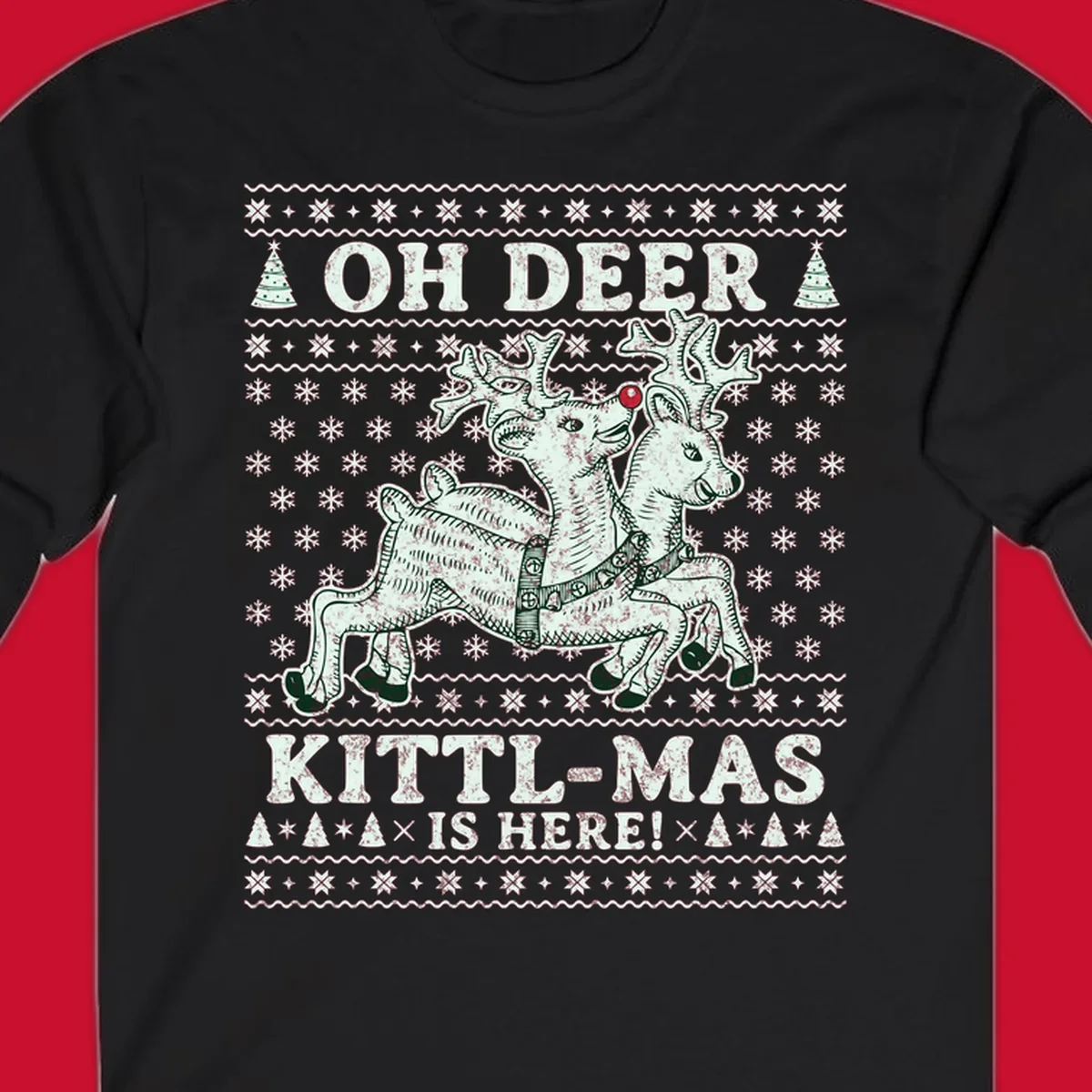 Oh Deer Kittl-Mas reindeer illustration with snowflakes and Christmas trees.