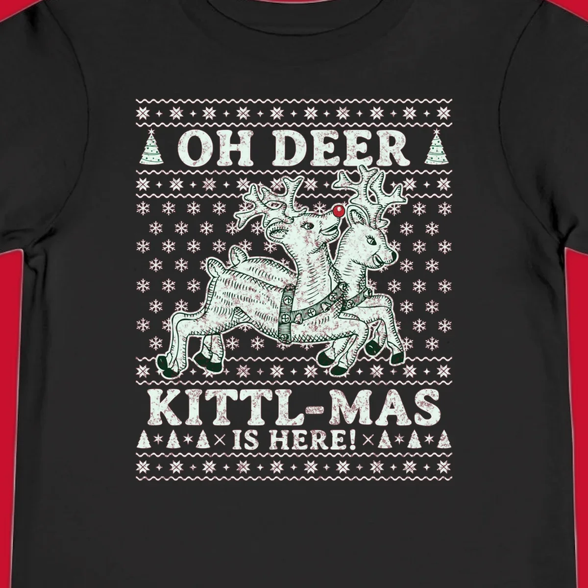 Oh Deer Kittl-Mas reindeer illustration with snowflakes and Christmas trees.