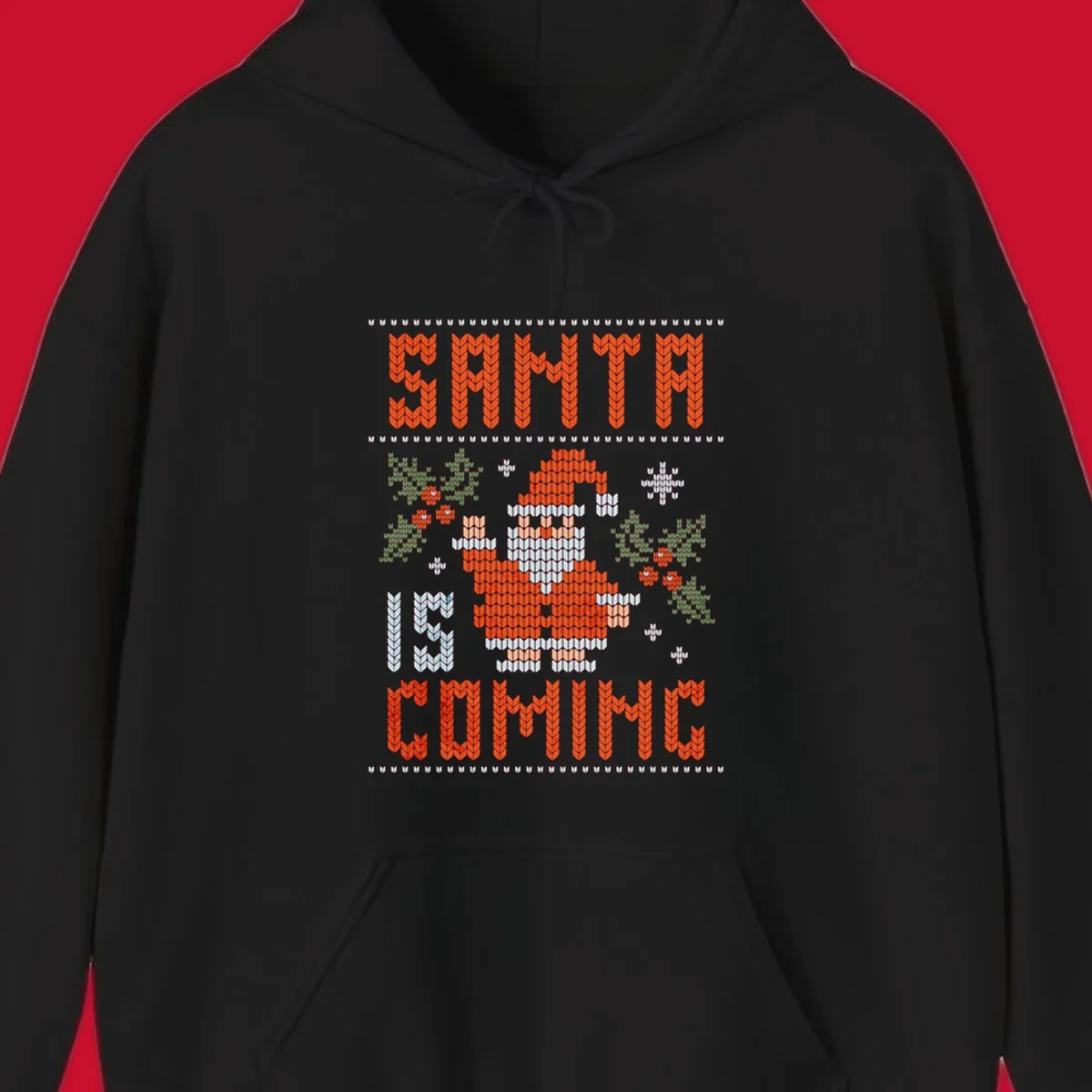 Santa is coming ugly Christmas sweater with pixelated Santa, holly, and snowflakes.