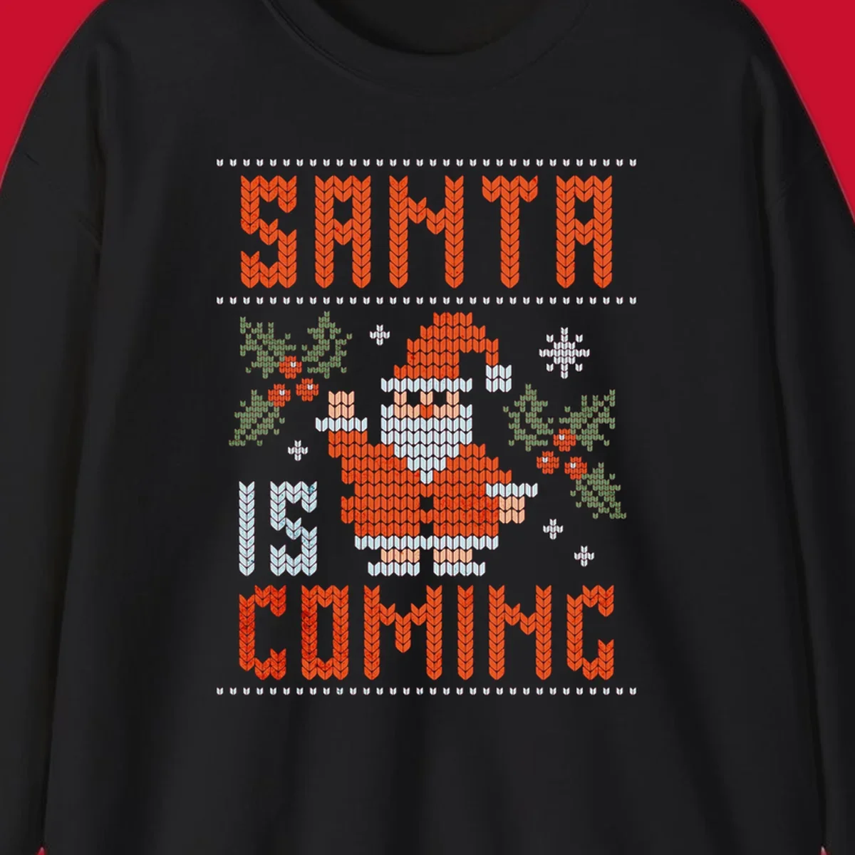 Santa is coming ugly Christmas sweater with pixelated Santa, holly, and snowflakes.
