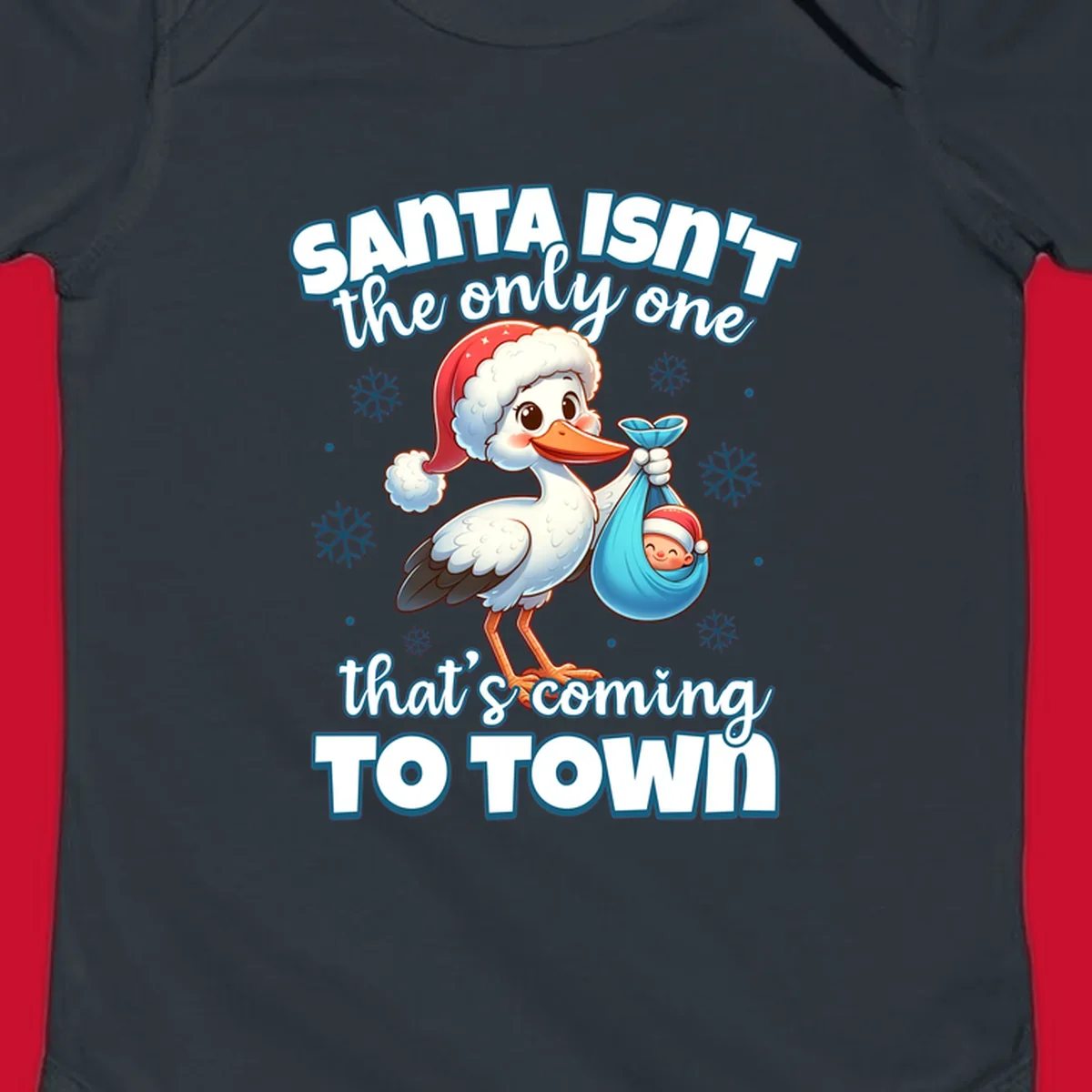 Stork carrying a baby with text "Santa Isn't The Only One That's Coming To Town".
