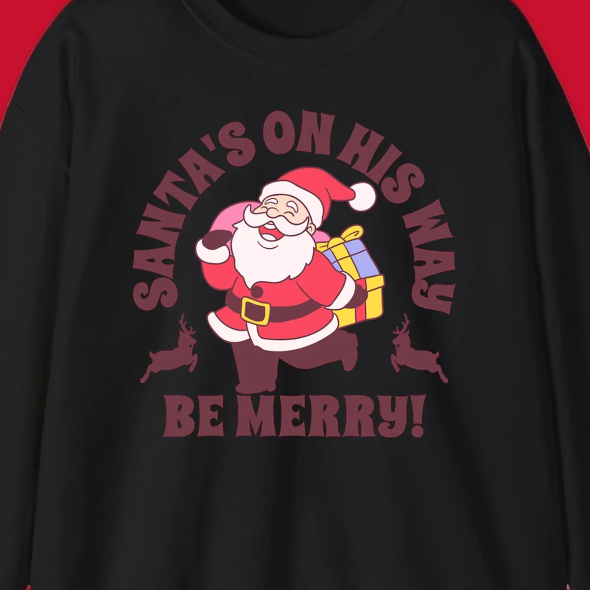 Illustration of Santa Claus running with gifts and reindeer, text reads Santa's on His Way Be Merry.