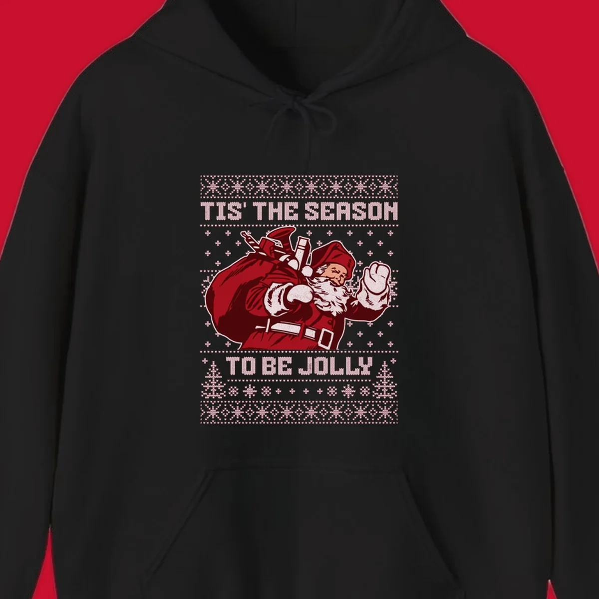 Santa Claus with gift bag and 'Tis The Season To Be Jolly' text on an ugly sweater background.