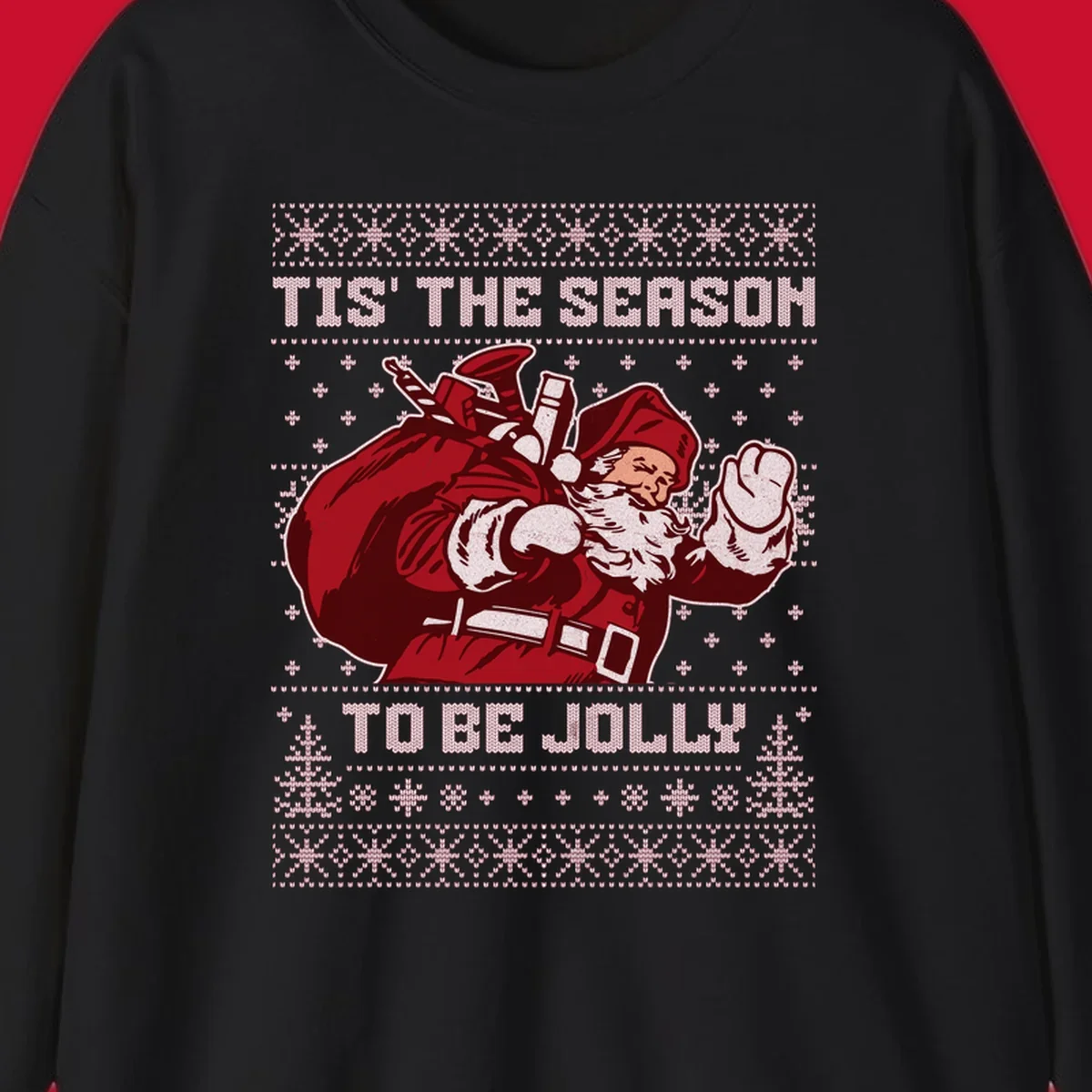 Santa Claus with gift bag and 'Tis The Season To Be Jolly' text on an ugly sweater background.