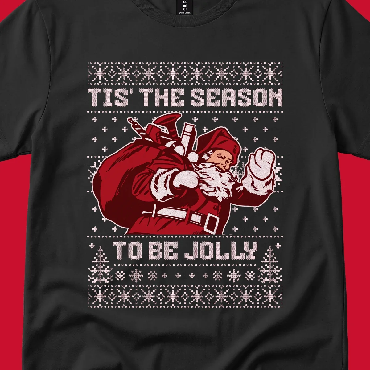 Santa Claus with gift bag and 'Tis The Season To Be Jolly' text on an ugly sweater background.