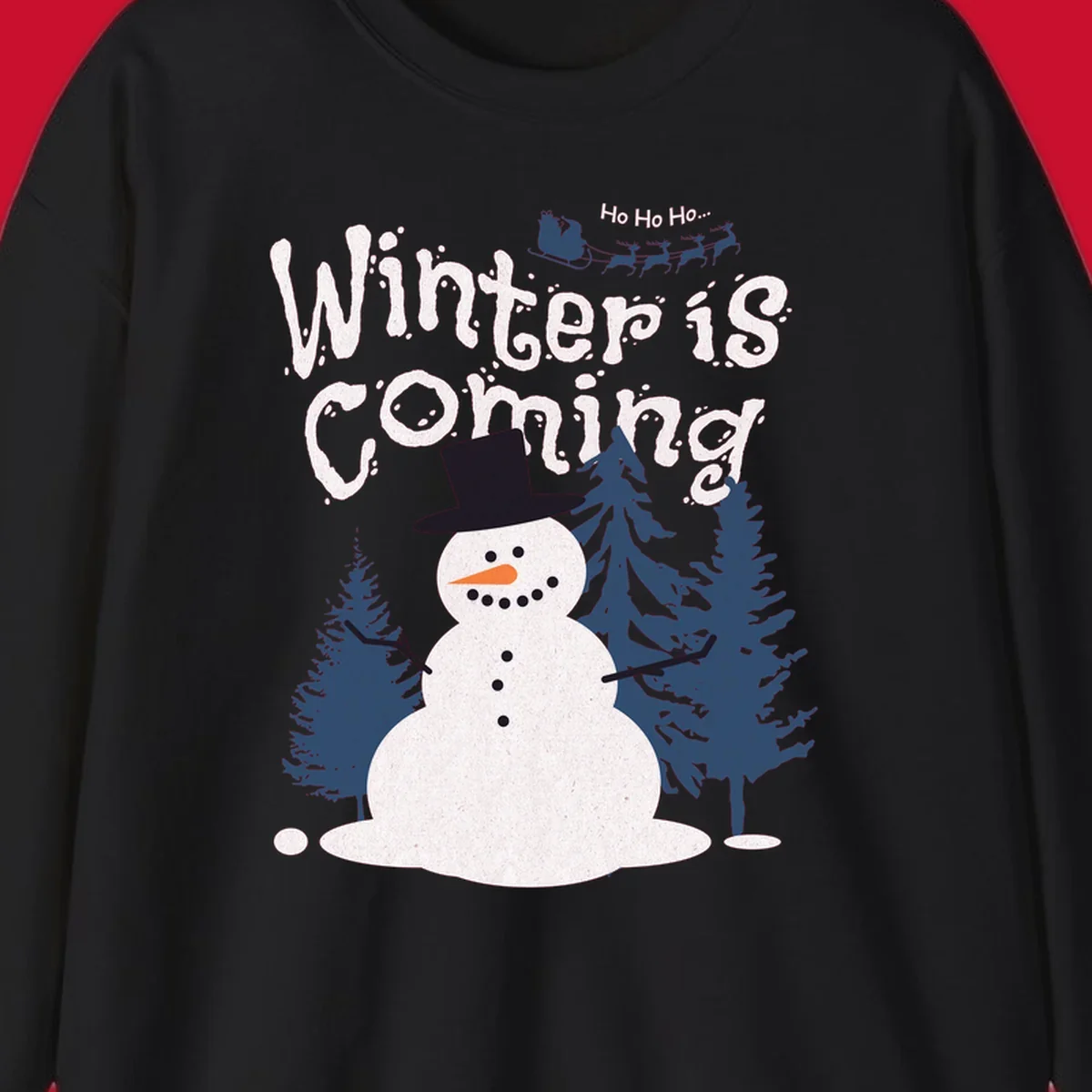 Winter is Coming Snowman Holiday design featuring a snowman, trees, and Santa's sleigh.