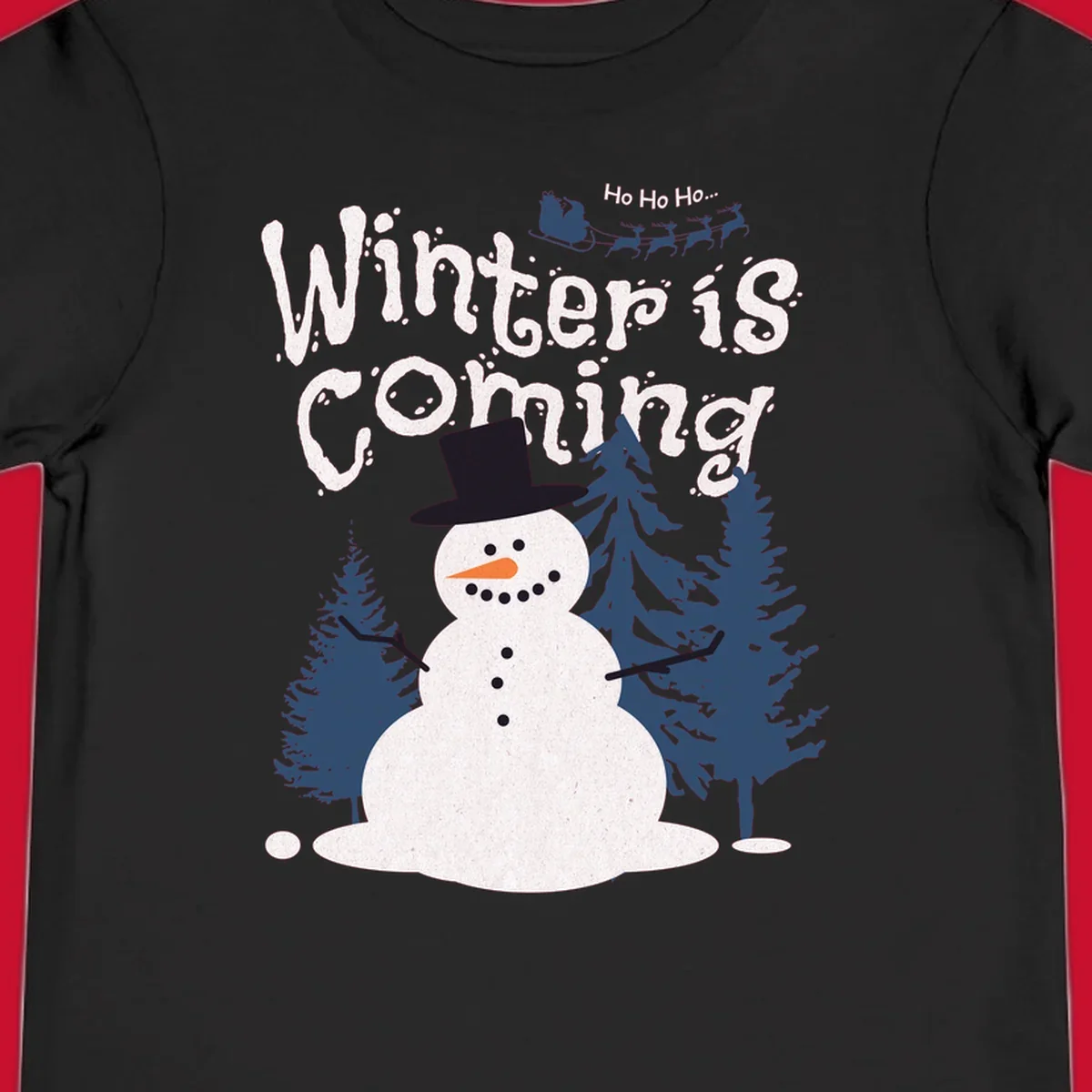 Winter is Coming Snowman Holiday design featuring a snowman, trees, and Santa's sleigh.