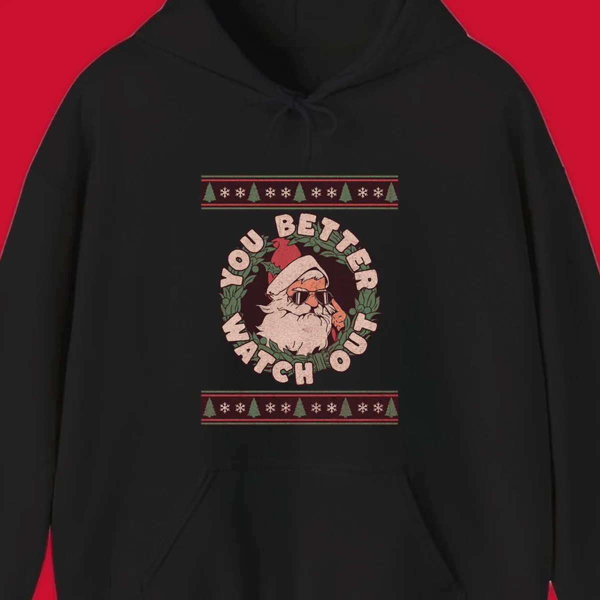 Santa Claus wearing sunglasses in a holly wreath with text, part of the santa-watch-out-christmas design.