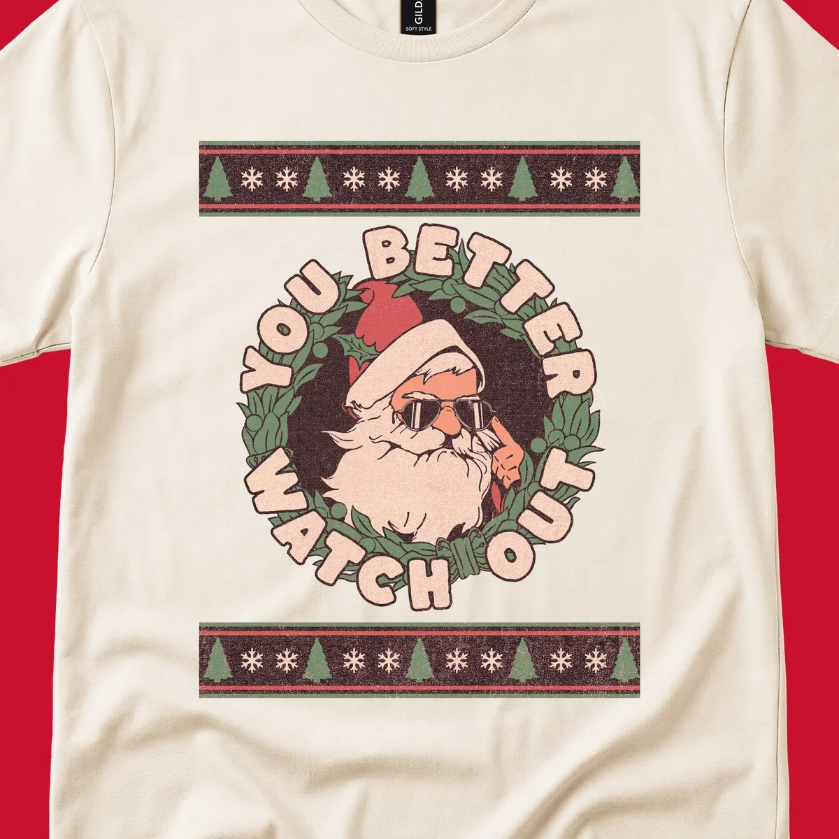 Santa Claus wearing sunglasses in a holly wreath with text, part of the santa-watch-out-christmas design.