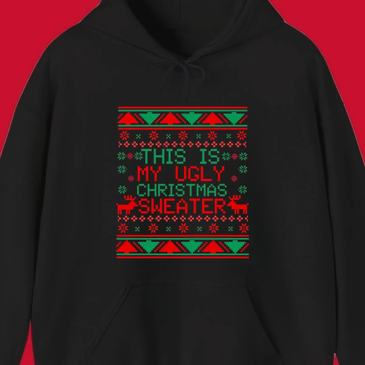 Ugly Christmas sweater statement design with pixelated text, reindeer, and snowflakes.