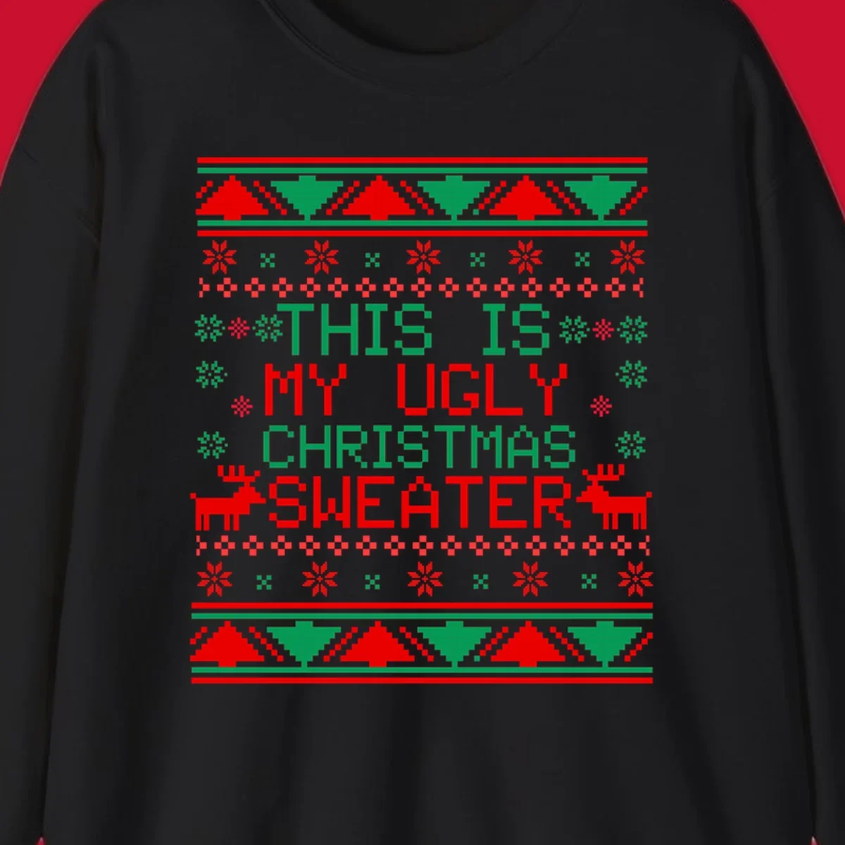 Ugly Christmas sweater statement design with pixelated text, reindeer, and snowflakes.