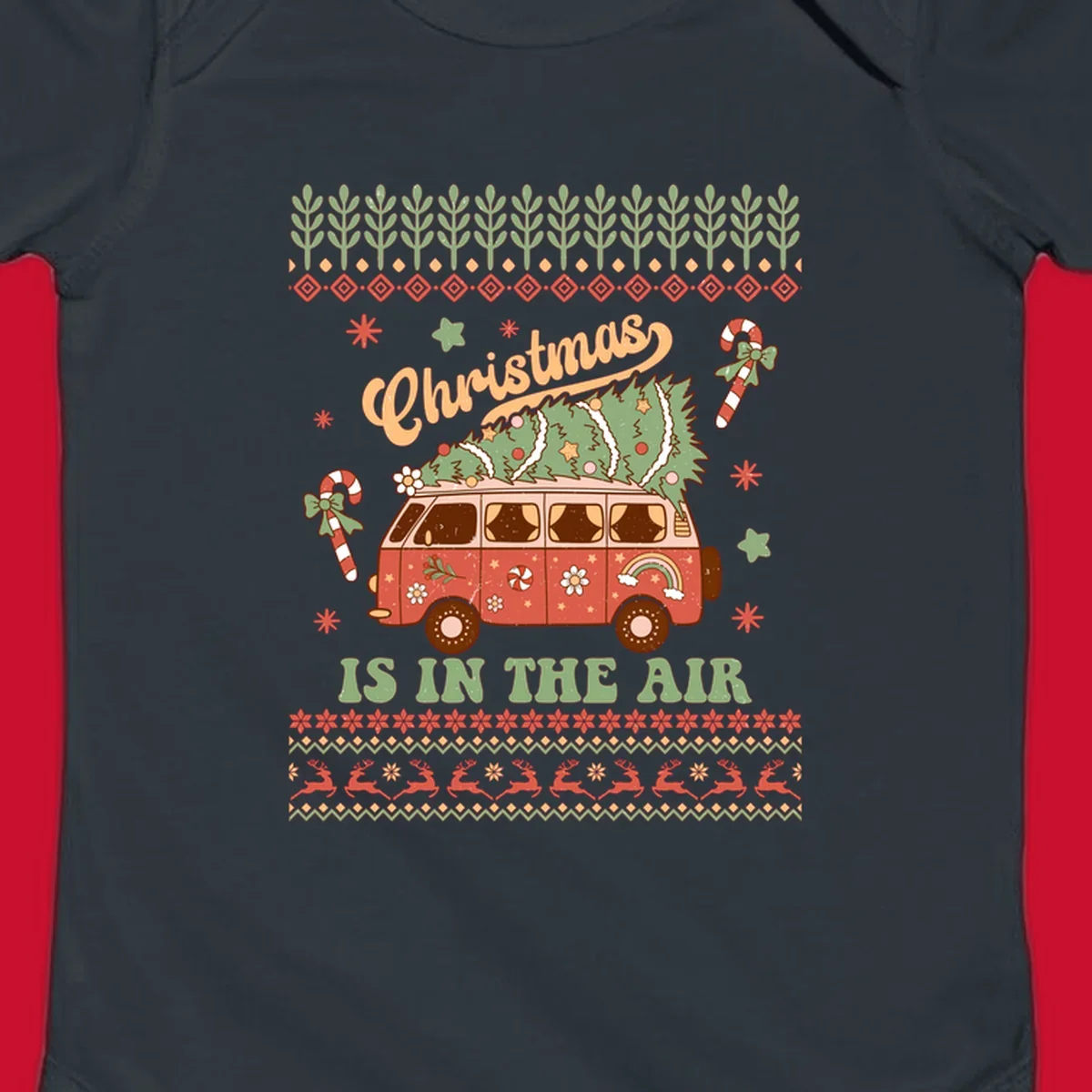 Retro Christmas van with tree on roof and 'Christmas IS IN THE AIR' text.