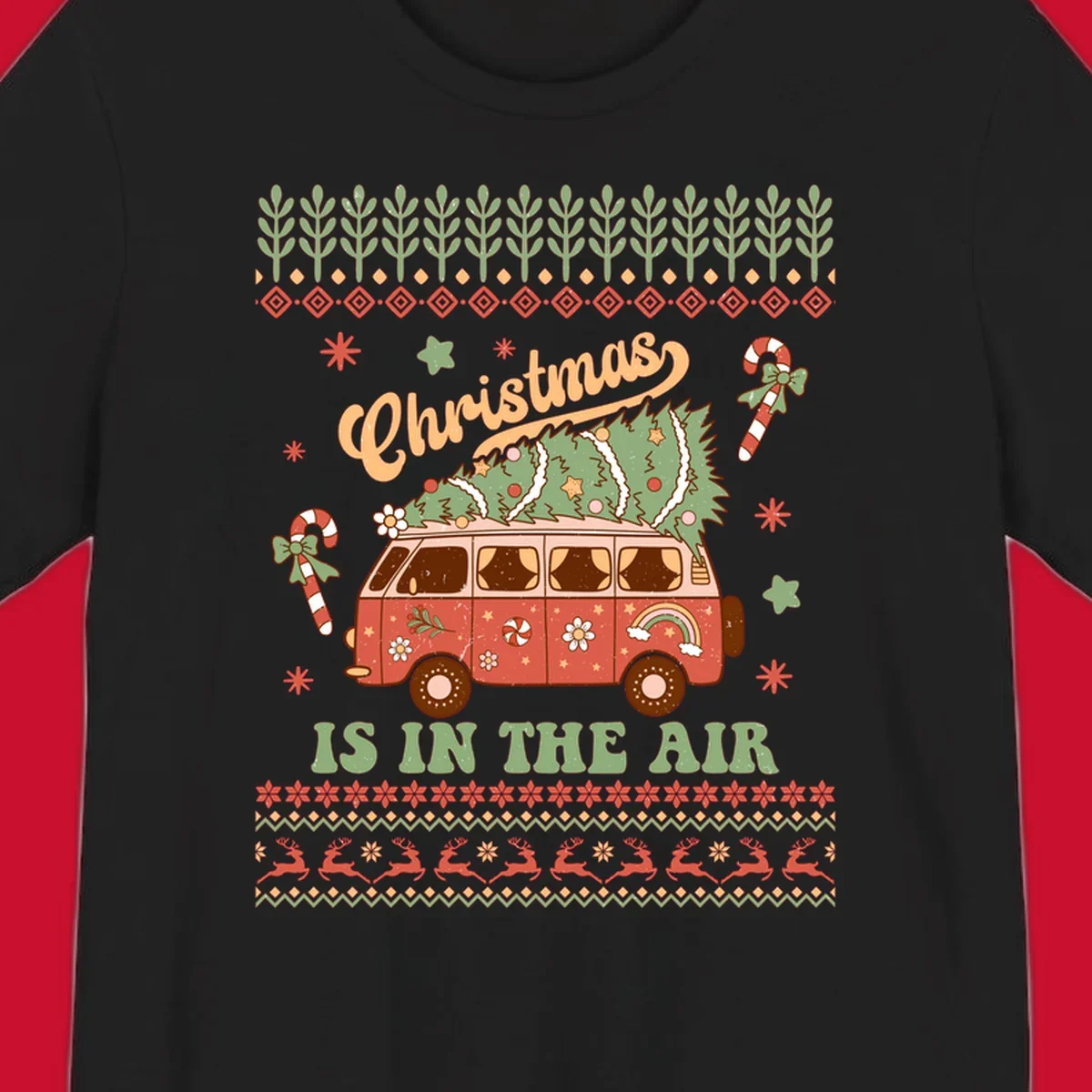 Retro Christmas van with tree on roof and 'Christmas IS IN THE AIR' text.