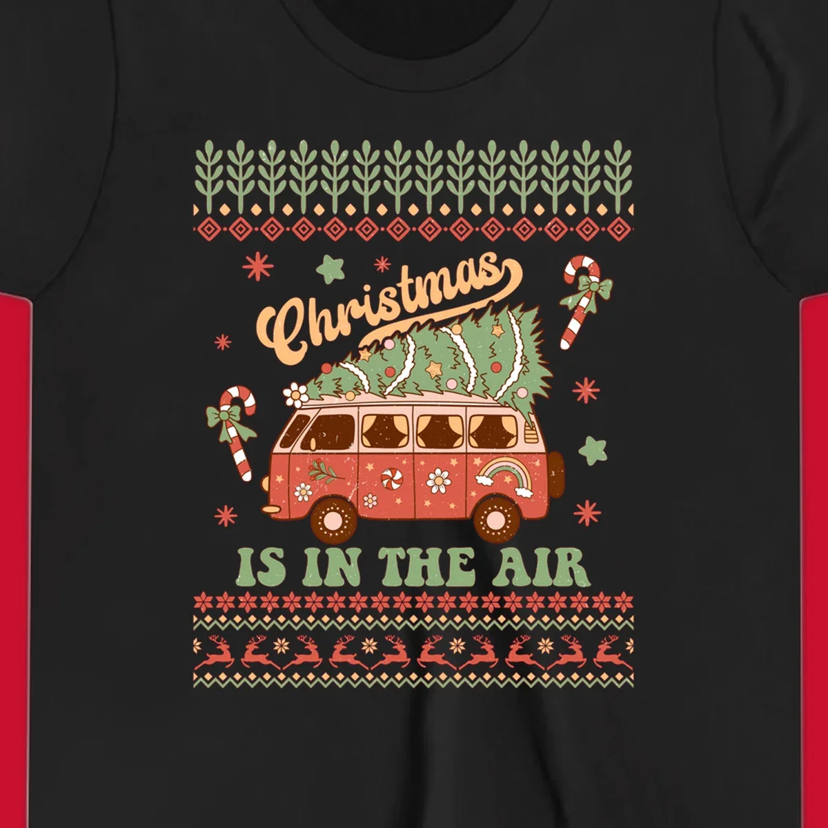 Retro Christmas van with tree on roof and 'Christmas IS IN THE AIR' text.