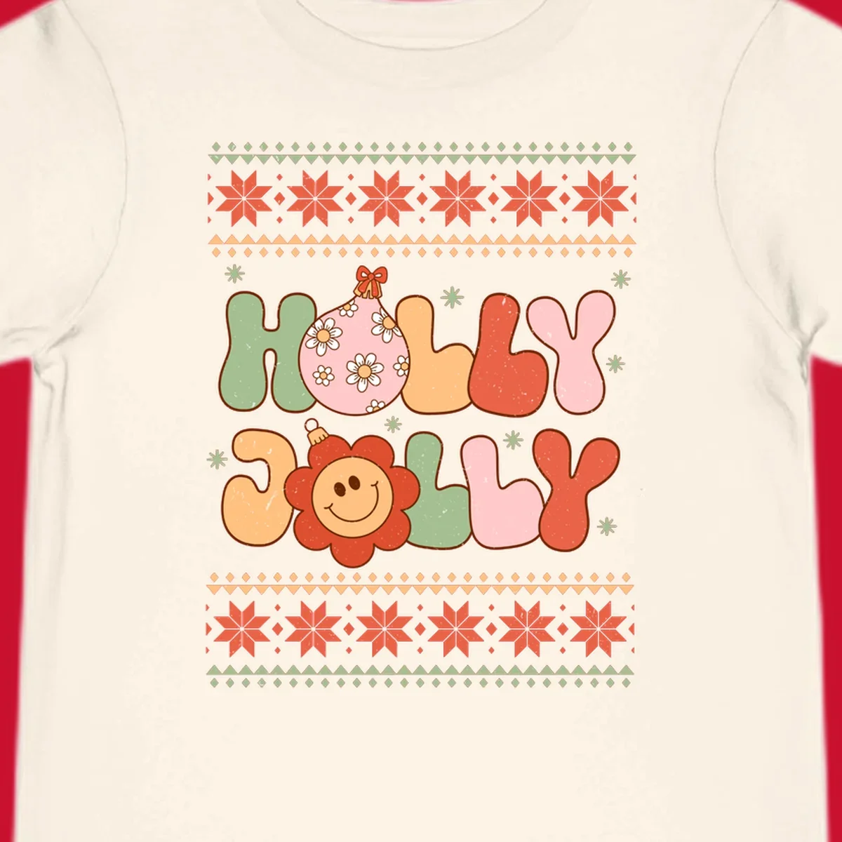 Retro Christmas holly jolly text design with ornaments and smiley flowers.