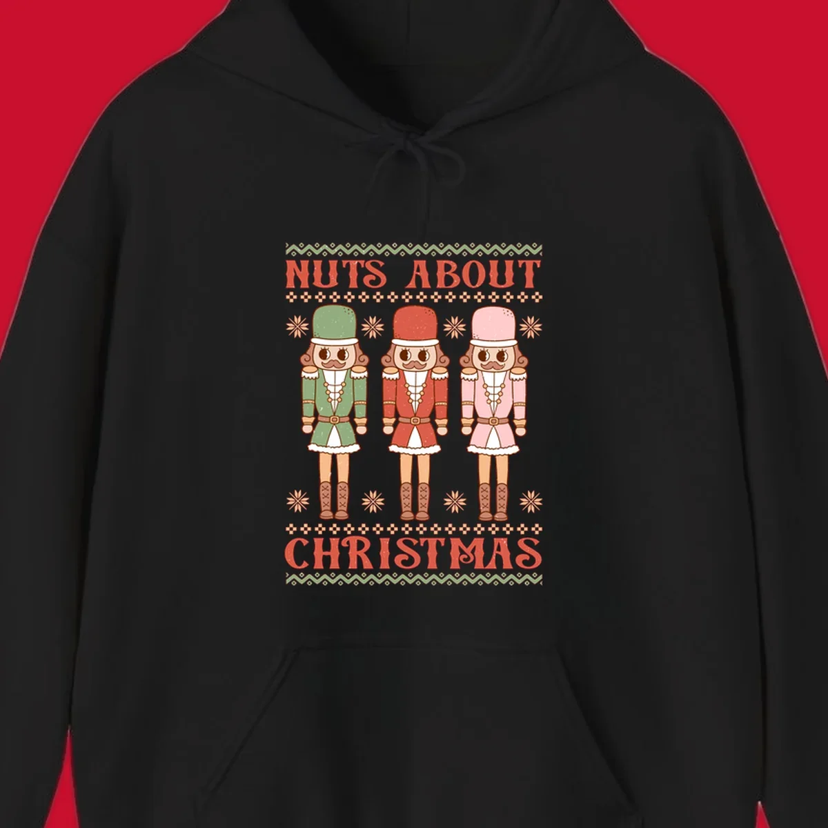 Illustration of three colorful nutcracker soldiers with text 'NUTS ABOUT CHRISTMAS' for Christmas nutcrackers design.