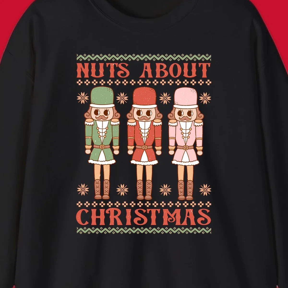 Illustration of three colorful nutcracker soldiers with text 'NUTS ABOUT CHRISTMAS' for Christmas nutcrackers design.