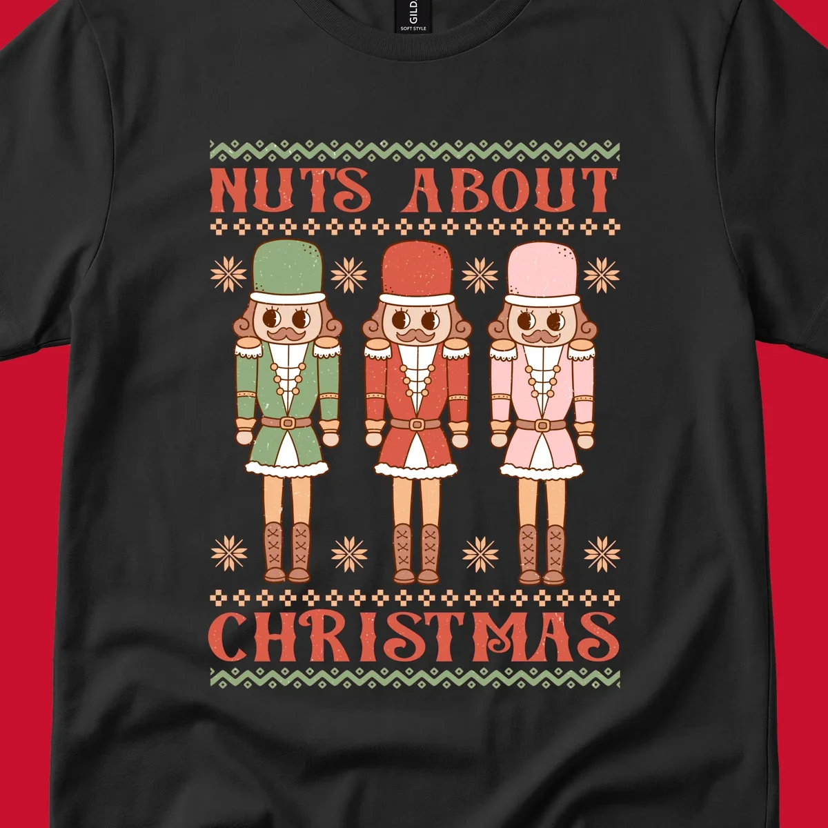 Illustration of three colorful nutcracker soldiers with text 'NUTS ABOUT CHRISTMAS' for Christmas nutcrackers design.