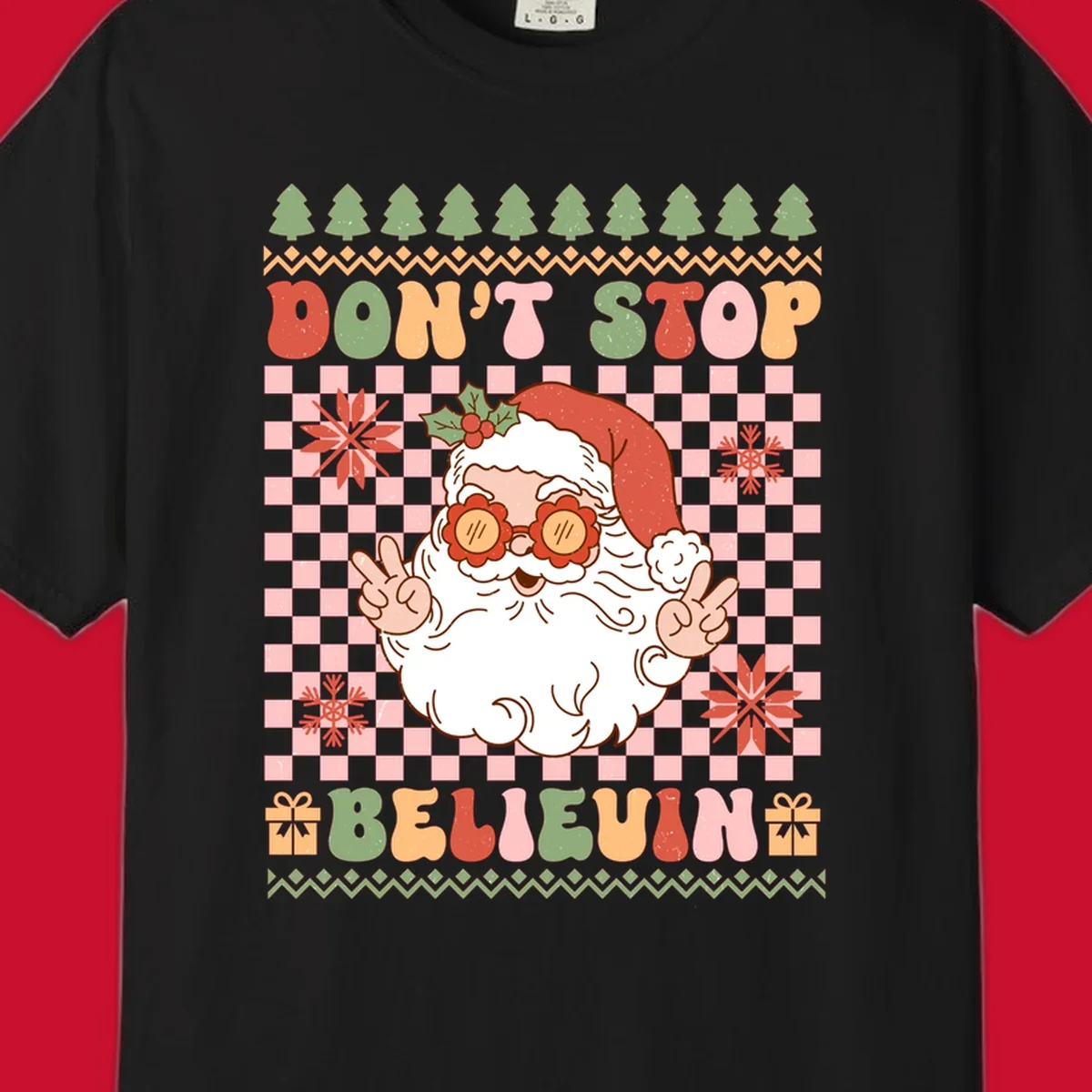 Retro Santa Claus with peace signs and sunglasses, text 'DON'T STOP BELIEVIN''.
