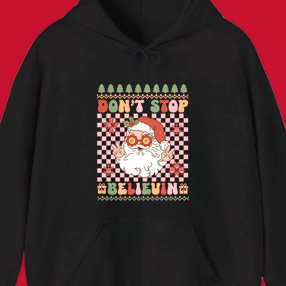 Retro Santa Claus with peace signs and sunglasses, text 'DON'T STOP BELIEVIN''.