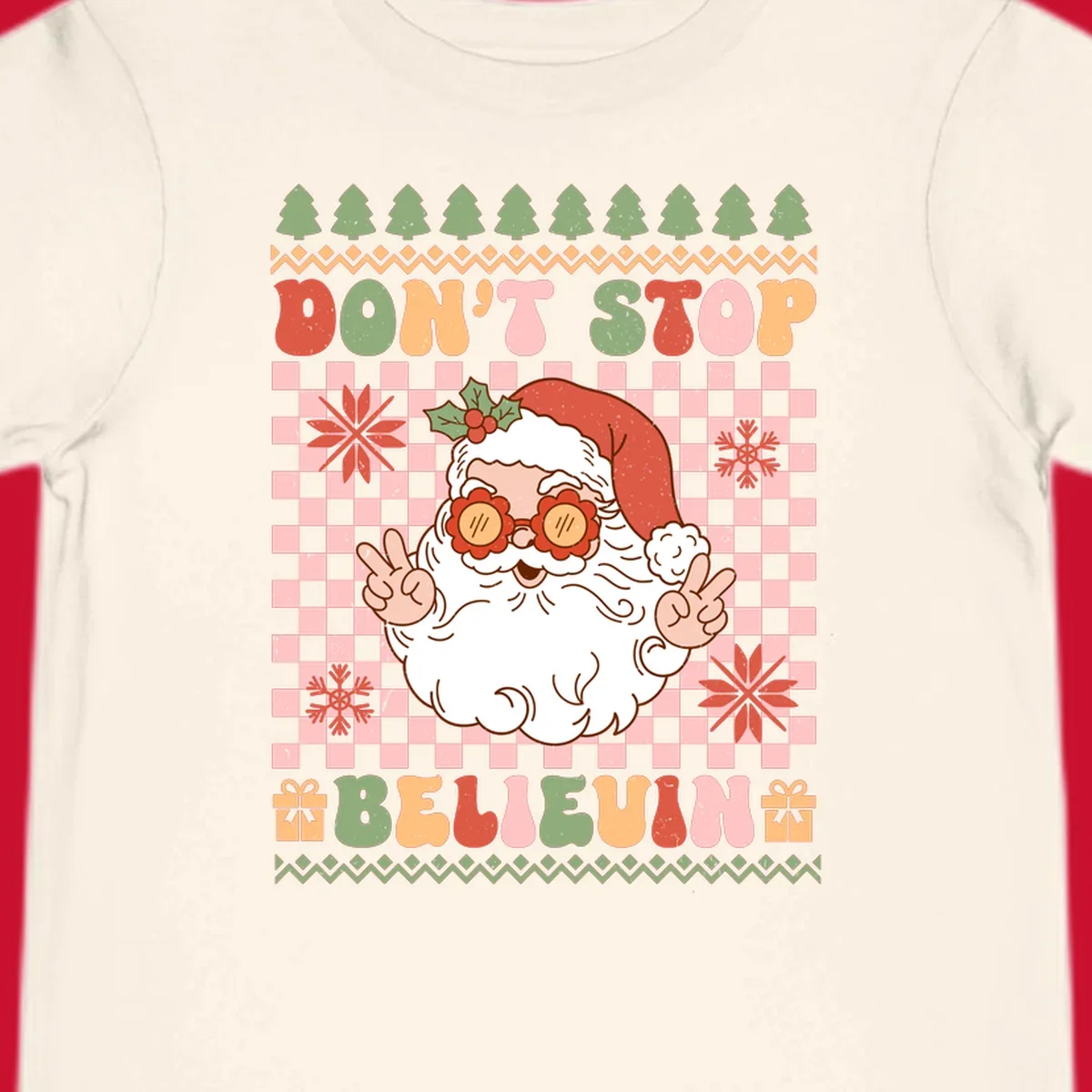Retro Santa Claus with peace signs and sunglasses, text 'DON'T STOP BELIEVIN''.